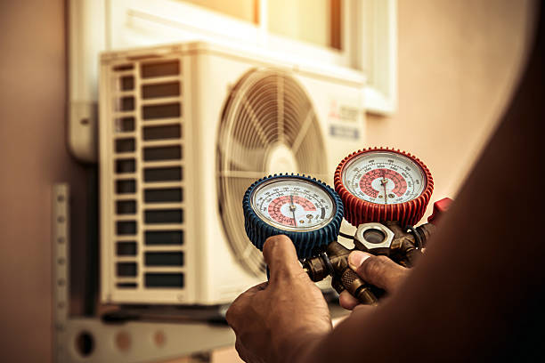 Professional Hvac technician working in Higley, AZ